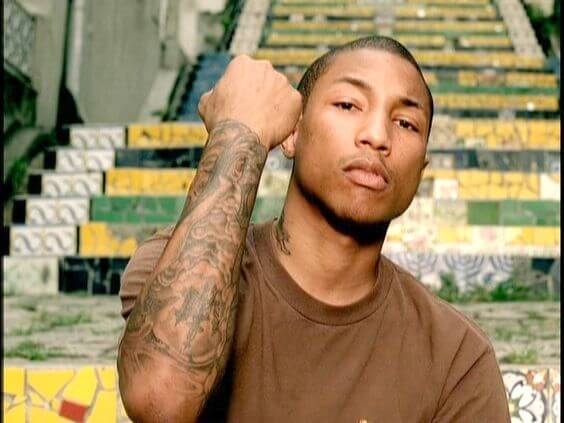 pharrell williams tattoos 5 Pharrell Williams Removes Tattoos Before and After
