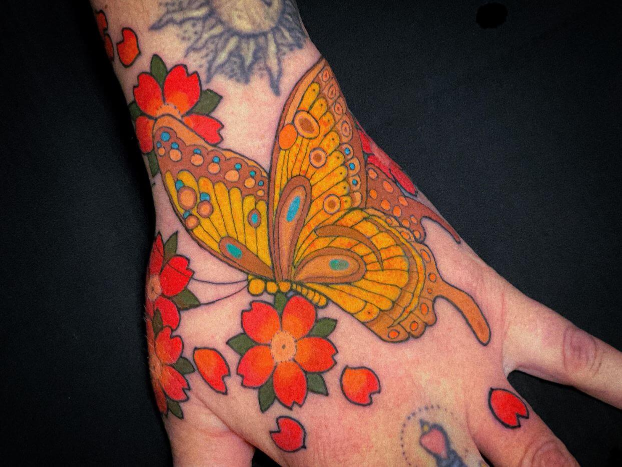 butterfly hand tattoo 115 145 Unique Ideas For Butterfly Hand Tattoos And Their Meanings