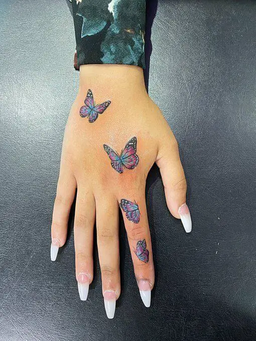 butterfly hand tattoo 120 145 Unique Ideas For Butterfly Hand Tattoos And Their Meanings