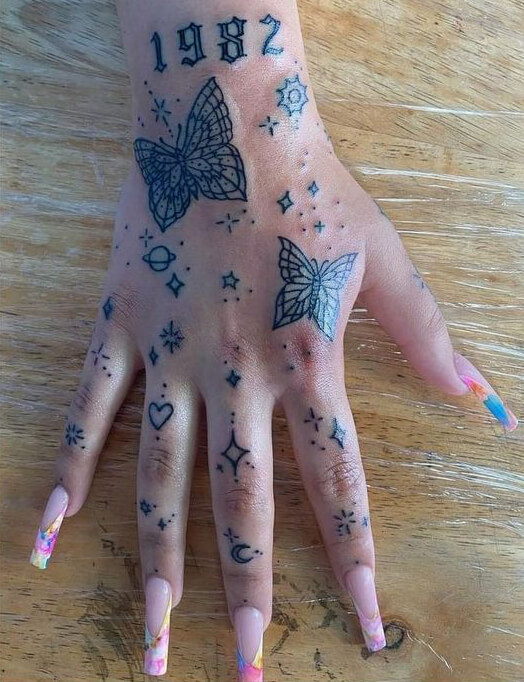 butterfly hand tattoo 137 145 Unique Ideas For Butterfly Hand Tattoos And Their Meanings