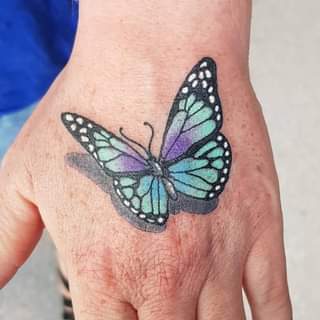 butterfly hand tattoo 3 1 145 Unique Ideas For Butterfly Hand Tattoos And Their Meanings