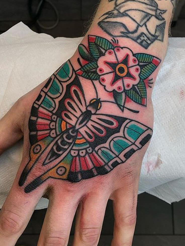 butterfly hand tattoo