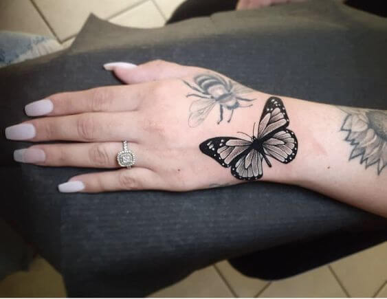 butterfly hand tattoo 58 145 Unique Ideas For Butterfly Hand Tattoos And Their Meanings