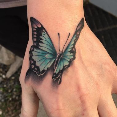butterfly hand tattoo 73 145 Unique Ideas For Butterfly Hand Tattoos And Their Meanings