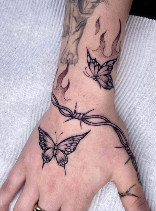 butterfly hand tattoo 76 145 Unique Ideas For Butterfly Hand Tattoos And Their Meanings