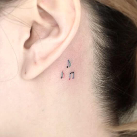 music note tattoo behind ear