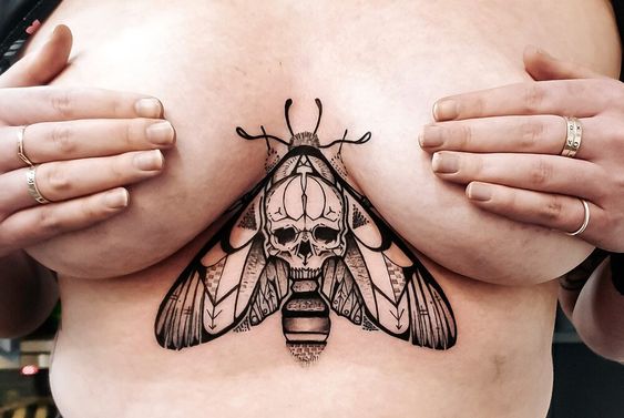 Death Moth Tattoo on the Sternum 3 50+ Death Moth Tattoos That Will Leave You Breathless
