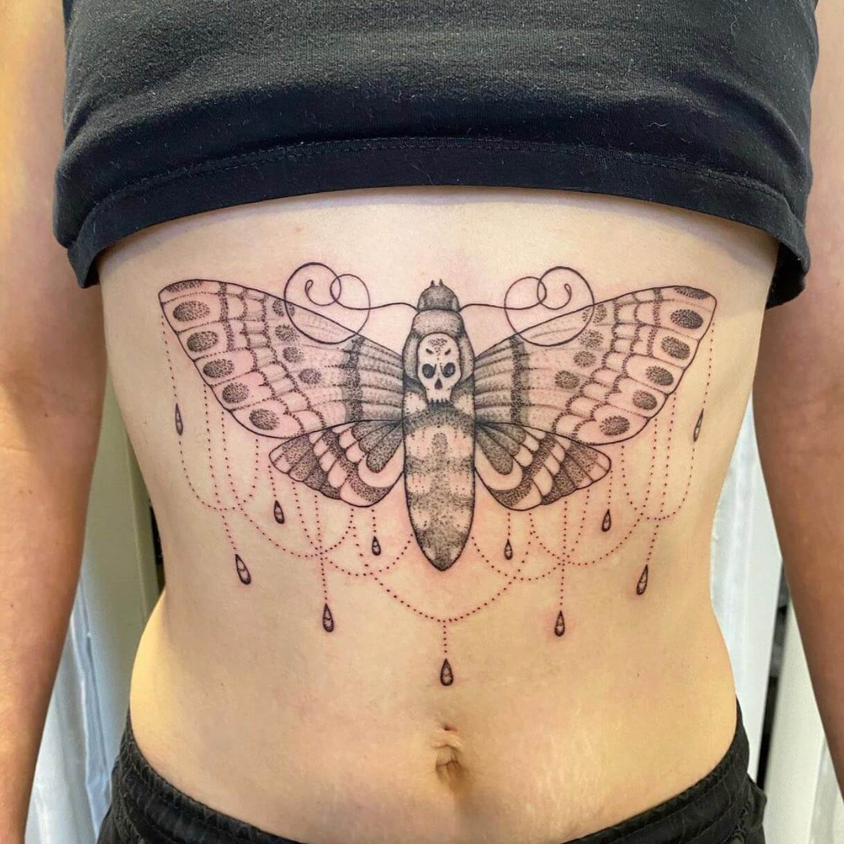Death Moth Tattoo on the Sternum 7 50+ Death Moth Tattoos That Will Leave You Breathless