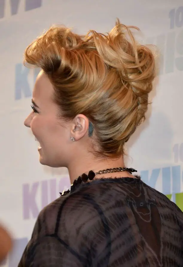 Demi Lovato Behind Ear Tattoo 2 Demi Lovato's Tattoos: The Teenage Idol Has More Than 30+ Designs On Her Body
