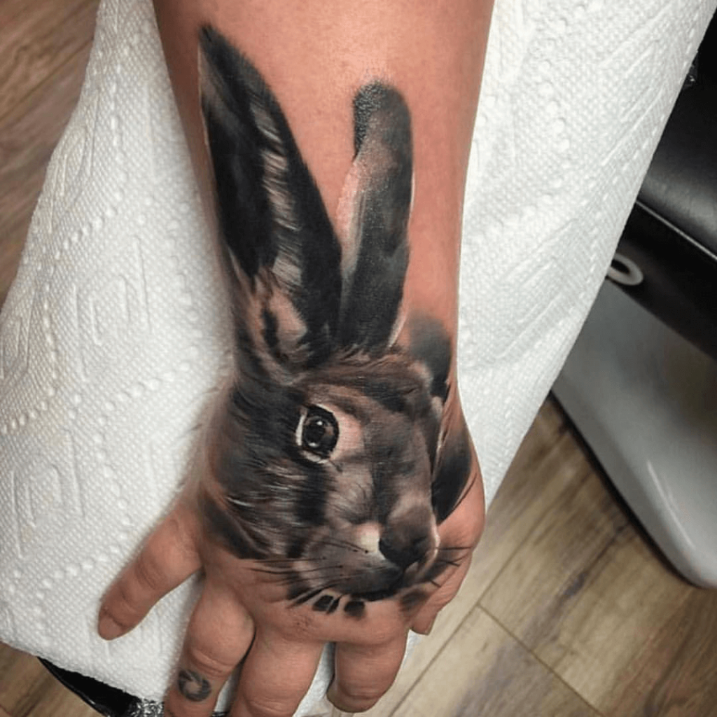 Rabbit Tattoo on Hand 3 Rabbit Tattoo: 50 Best Rabbit Tattoo Designs to Choose From (Men And Women)