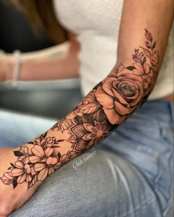 Flower Half Sleeve Tattoo 1 Creative & Classy Half Sleeve Tattoo Ideas for Women in 2022