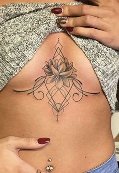 Lotus Flower Tattoo On The Chest 3 30+ Best Lotus Flower Tattoo Design Ideas (Meaning And Inspiration)
