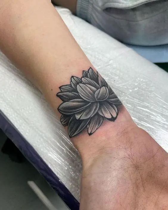 Lotus Flower Tattoo On Wrist 5 30+ Best Lotus Flower Tattoo Design Ideas (Meaning And Inspiration)
