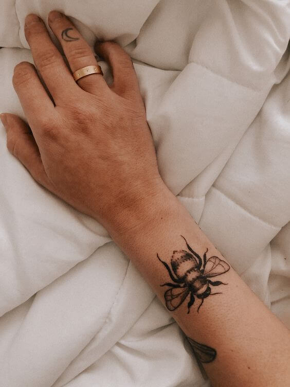 Womans Linework Bumblebee Hand Tattoo 2 30 Amazing Hand Tattoos For Women (The Most Popular & Latest Trends in 2023)