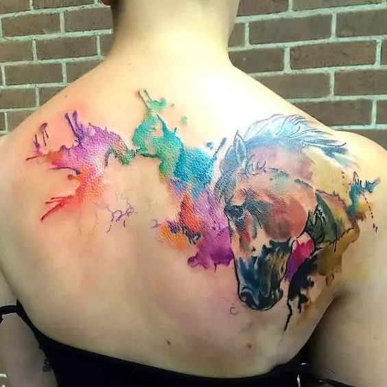 Colorful watercolor horse tattoos