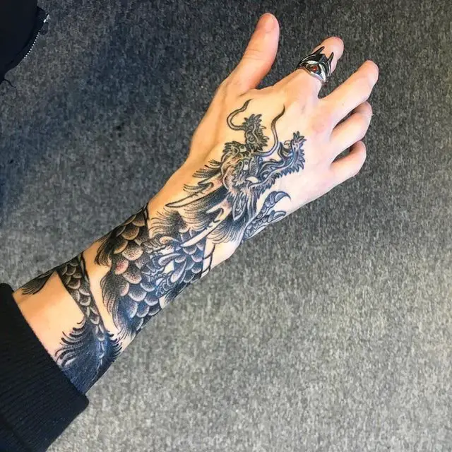 Dragon hand tattoos for men.