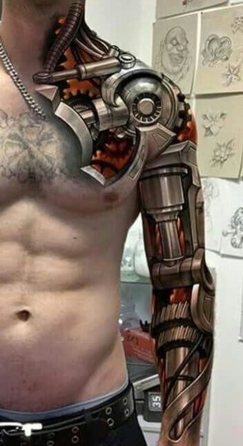 Men's biomechanical hand tattoos