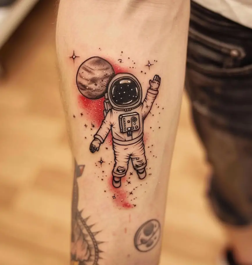 1. Classic Astronaut in Space 1 10 Best Astronaut Tattoo Designs in 2024: Symbols of Space Exploration