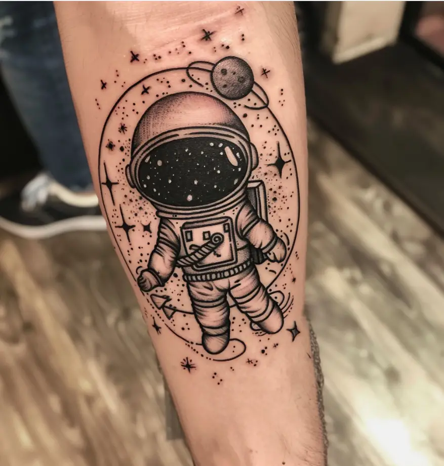 2. Astronaut with a Cosmic Background 1 10 Best Astronaut Tattoo Designs in 2024: Symbols of Space Exploration