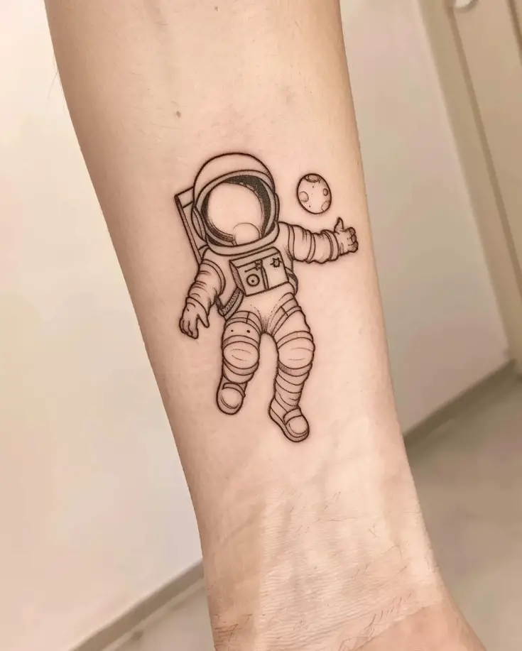 4. Minimalist Astronaut Tattoo 1 10 Best Astronaut Tattoo Designs in 2024: Symbols of Space Exploration