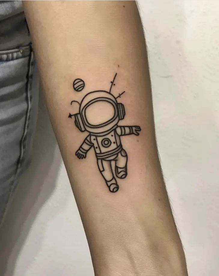 4. Minimalist Astronaut Tattoo 10 Best Astronaut Tattoo Designs in 2024: Symbols of Space Exploration
